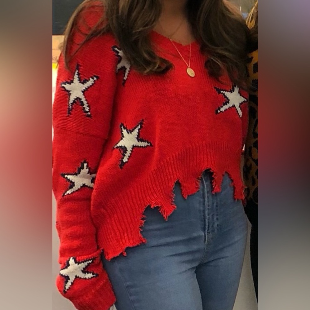 Red distressed star sweater